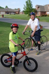 Steve Lovelace - biking with son